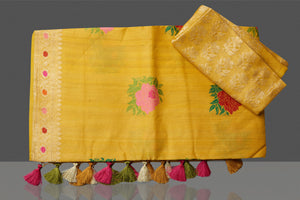 Buy beautiful yellow tussar georgette sari online in USA with floral weave buta and zari border. Look gorgeous on special occasions with exquisite Indian sarees, handwoven sarees, Banarasi sarees, pure silk sarees from Pure Elegance Indian saree store in USA.-blouse