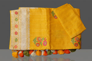 Buy gorgeous mustard tussar georgette sari online in USA with floral weave buta and zari border. Look gorgeous on special occasions with exquisite Indian sarees, handwoven sarees, Banarasi sarees, pure silk sarees from Pure Elegance Indian saree store in USA.-blouse
