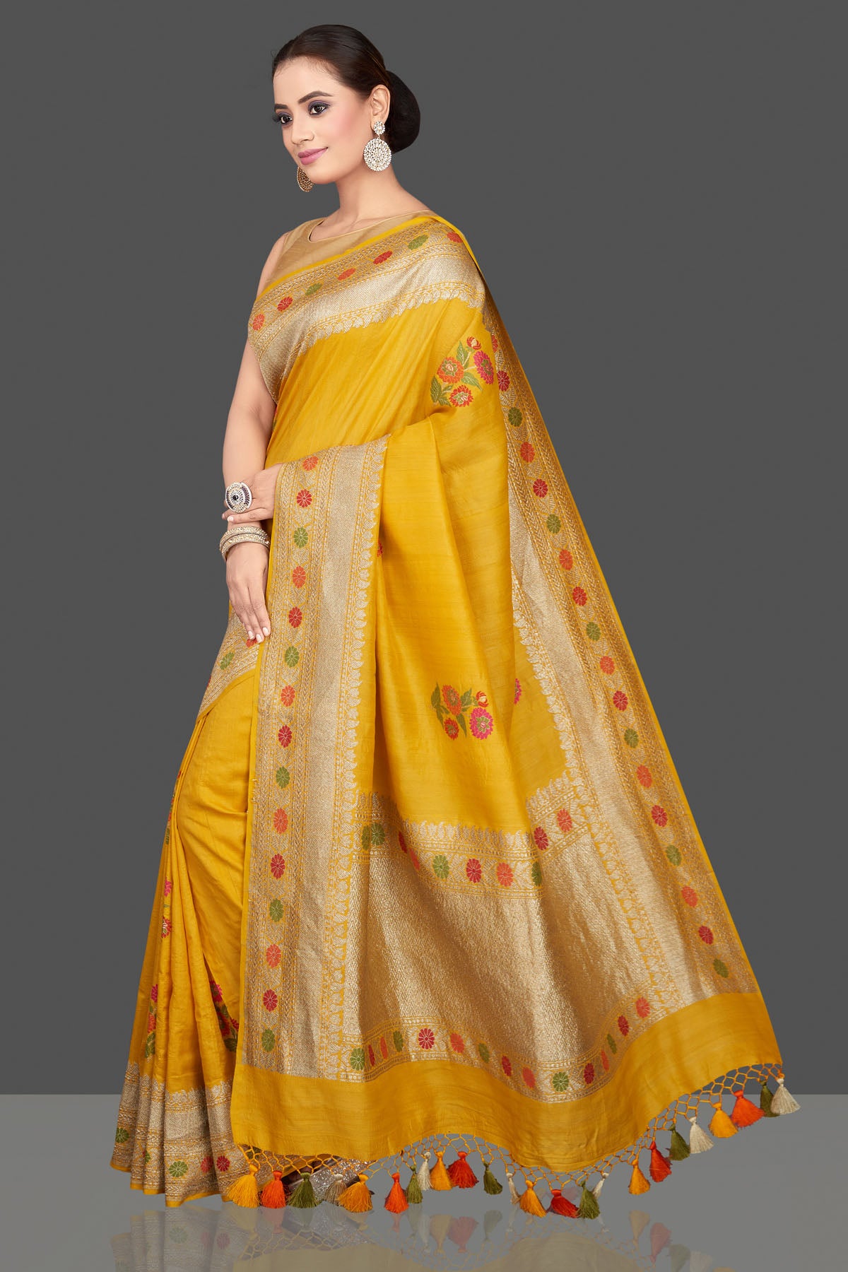 Buy gorgeous mustard tussar georgette sari online in USA with floral weave buta and zari border. Look gorgeous on special occasions with exquisite Indian sarees, handwoven sarees, Banarasi sarees, pure silk sarees from Pure Elegance Indian saree store in USA.-pallu