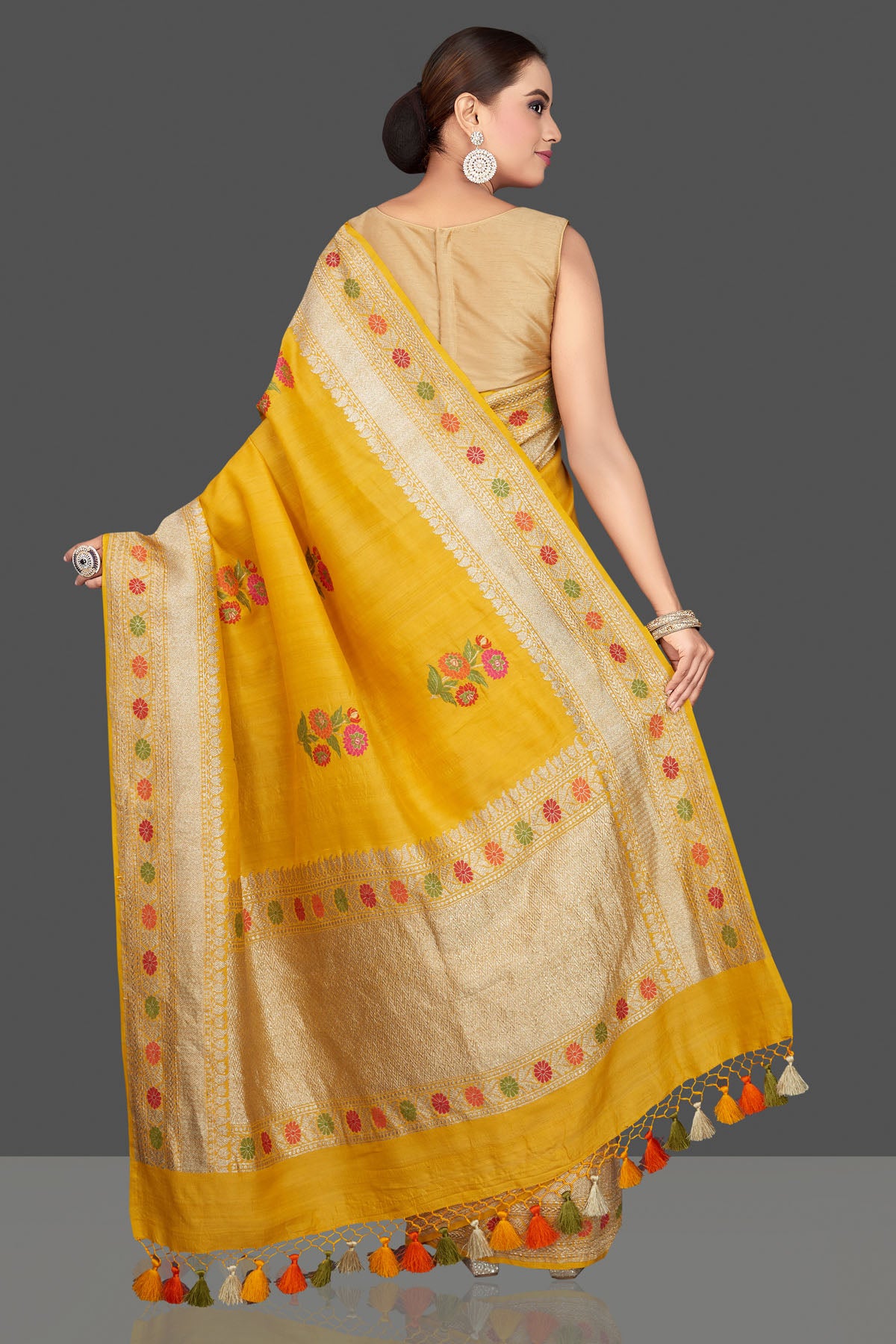Buy gorgeous mustard tussar georgette sari online in USA with floral weave buta and zari border. Look gorgeous on special occasions with exquisite Indian sarees, handwoven sarees, Banarasi sarees, pure silk sarees from Pure Elegance Indian saree store in USA.-back