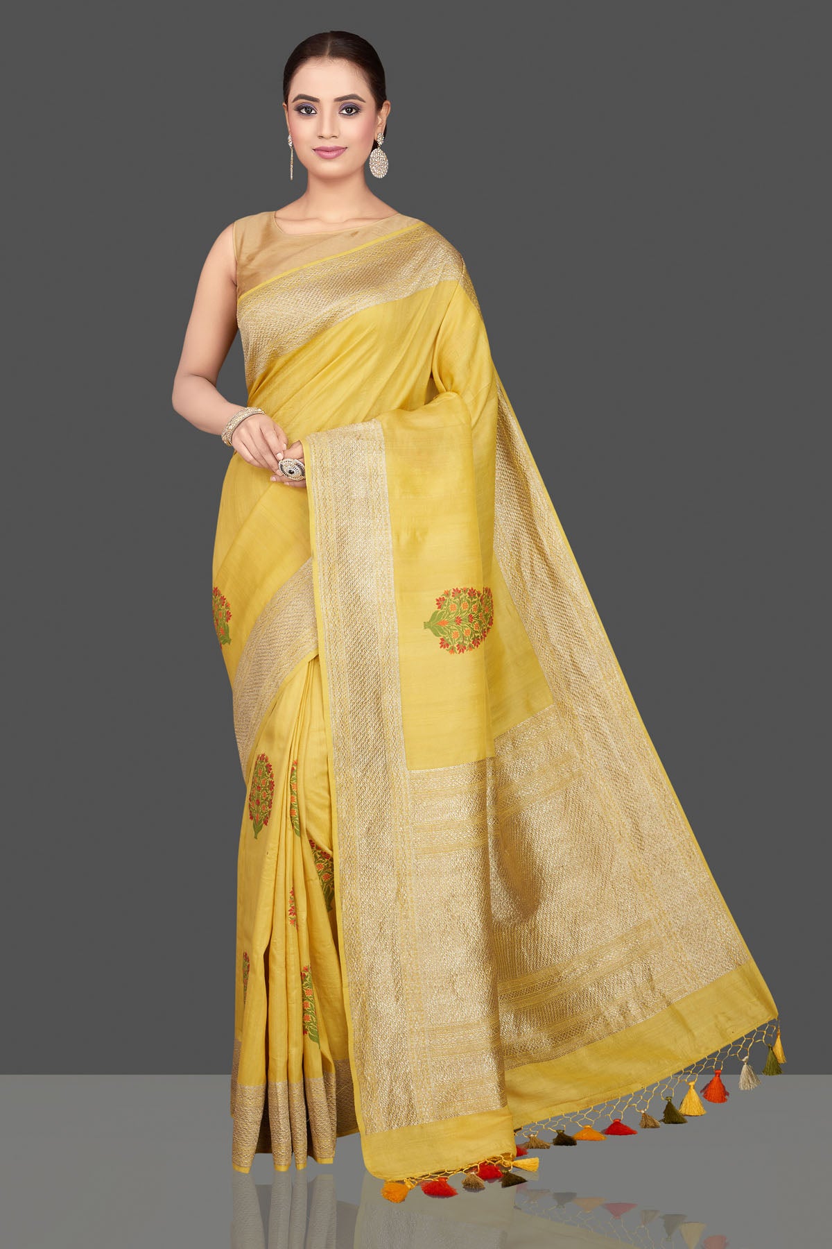 Buy stunning light yellow tussar georgette sari online in USA with tree weave buta and zari border. Look gorgeous on special occasions with exquisite Indian sarees, handwoven sarees, Banarasi sarees, pure silk sarees from Pure Elegance Indian saree store in USA.-full view