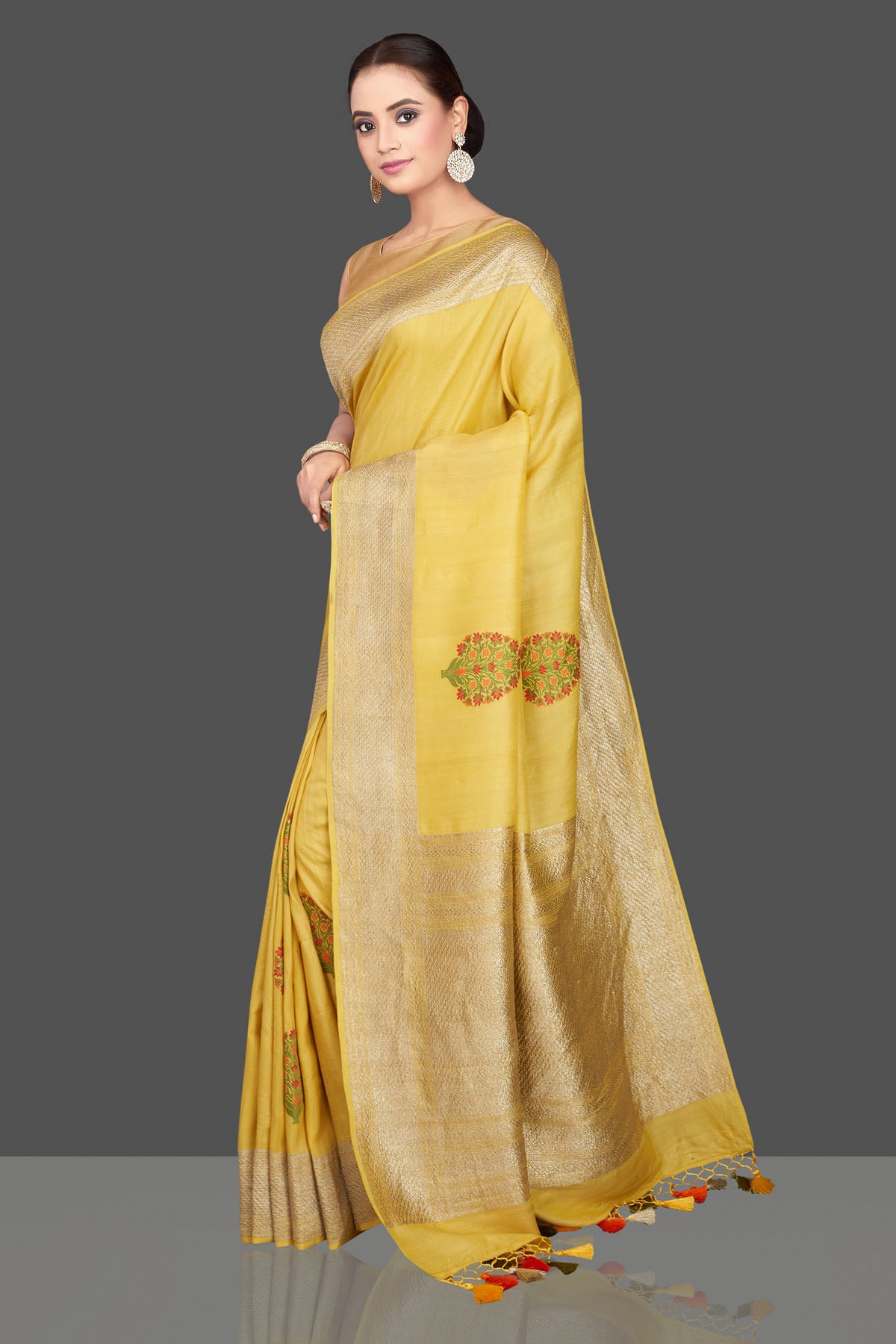 Buy stunning light yellow tussar georgette sari online in USA with tree weave buta and zari border. Look gorgeous on special occasions with exquisite Indian sarees, handwoven sarees, Banarasi sarees, pure silk sarees from Pure Elegance Indian saree store in USA.-pallu