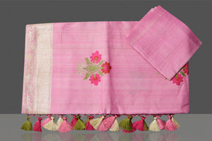 Shop gorgeous light pink tussar georgette sari online in USA with floral weave buta and silver zari border. Look gorgeous on special occasions with exquisite Indian sarees, handwoven sarees, Banarasi sarees, pure silk sarees from Pure Elegance Indian saree store in USA.-blouse