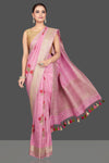 Shop gorgeous light pink tussar georgette sari online in USA with floral weave buta and silver zari border. Look gorgeous on special occasions with exquisite Indian sarees, handwoven sarees, Banarasi sarees, pure silk sarees from Pure Elegance Indian saree store in USA.-full view