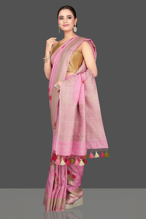 Shop gorgeous light pink tussar georgette sari online in USA with floral weave buta and silver zari border. Look gorgeous on special occasions with exquisite Indian sarees, handwoven sarees, Banarasi sarees, pure silk sarees from Pure Elegance Indian saree store in USA.-side