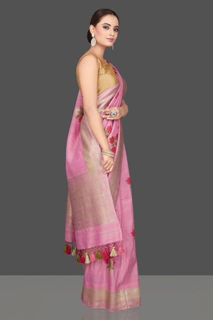 Shop gorgeous light pink tussar georgette sari online in USA with floral weave buta and silver zari border. Look gorgeous on special occasions with exquisite Indian sarees, handwoven sarees, Banarasi sarees, pure silk sarees from Pure Elegance Indian saree store in USA.-right