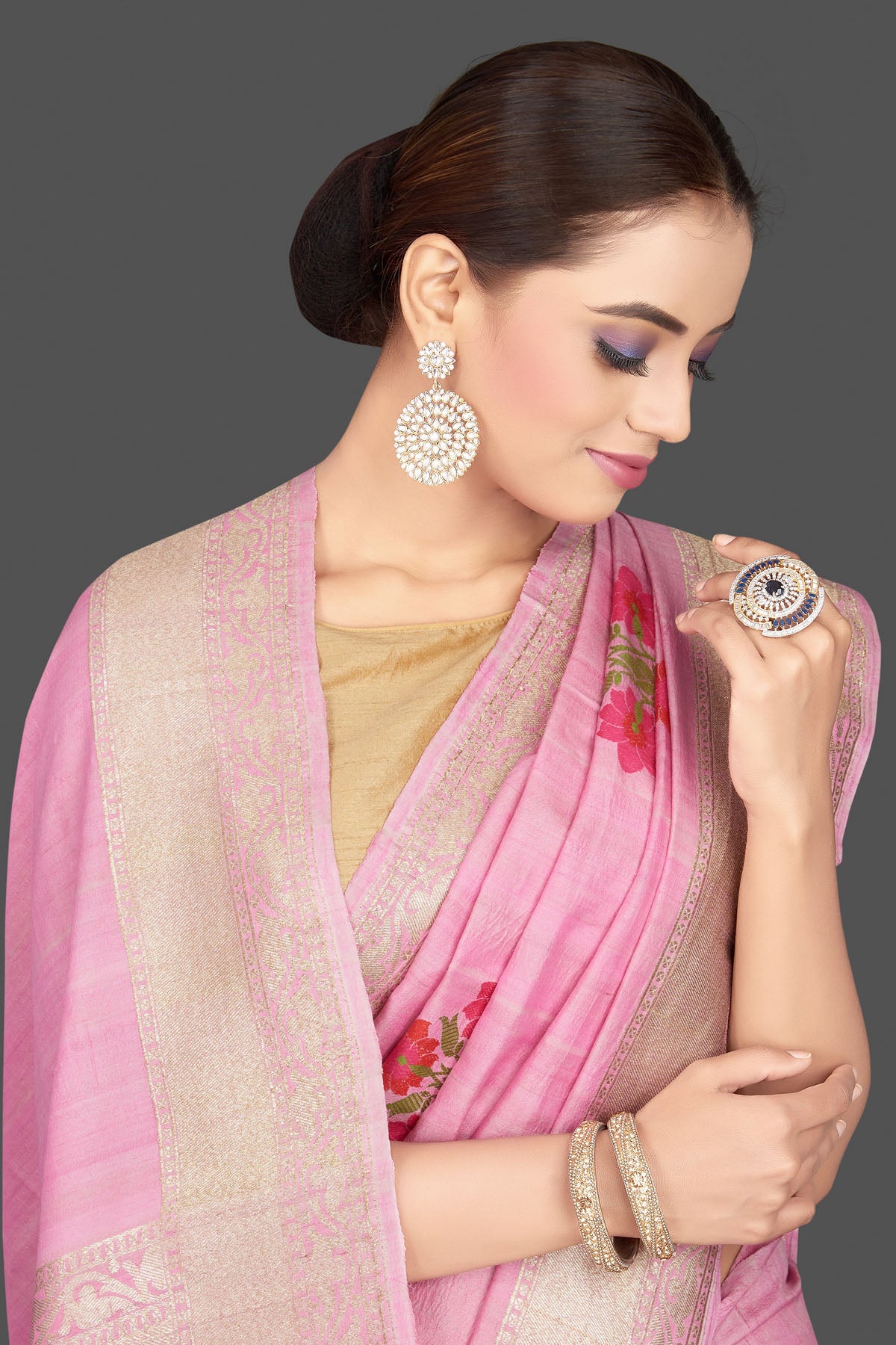 Shop gorgeous light pink tussar georgette sari online in USA with floral weave buta and silver zari border. Look gorgeous on special occasions with exquisite Indian sarees, handwoven sarees, Banarasi sarees, pure silk sarees from Pure Elegance Indian saree store in USA.-closeup