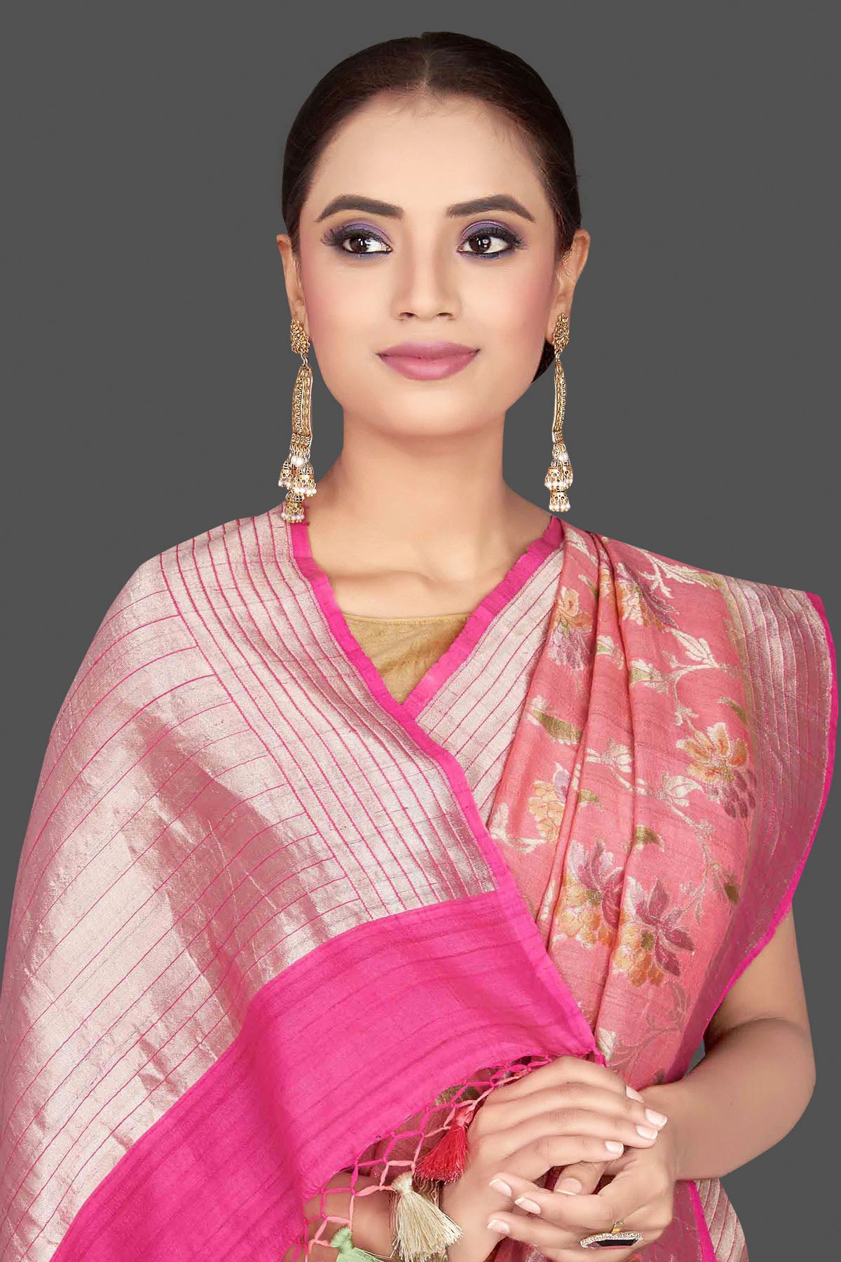 Buy stunning pink tussar georgette saree online in USA with floral zari jaal. Look gorgeous on special occasions with exquisite Indian sarees, handwoven sarees, Banarasi sarees, pure silk sarees from Pure Elegance Indian saree store in USA.-closeup