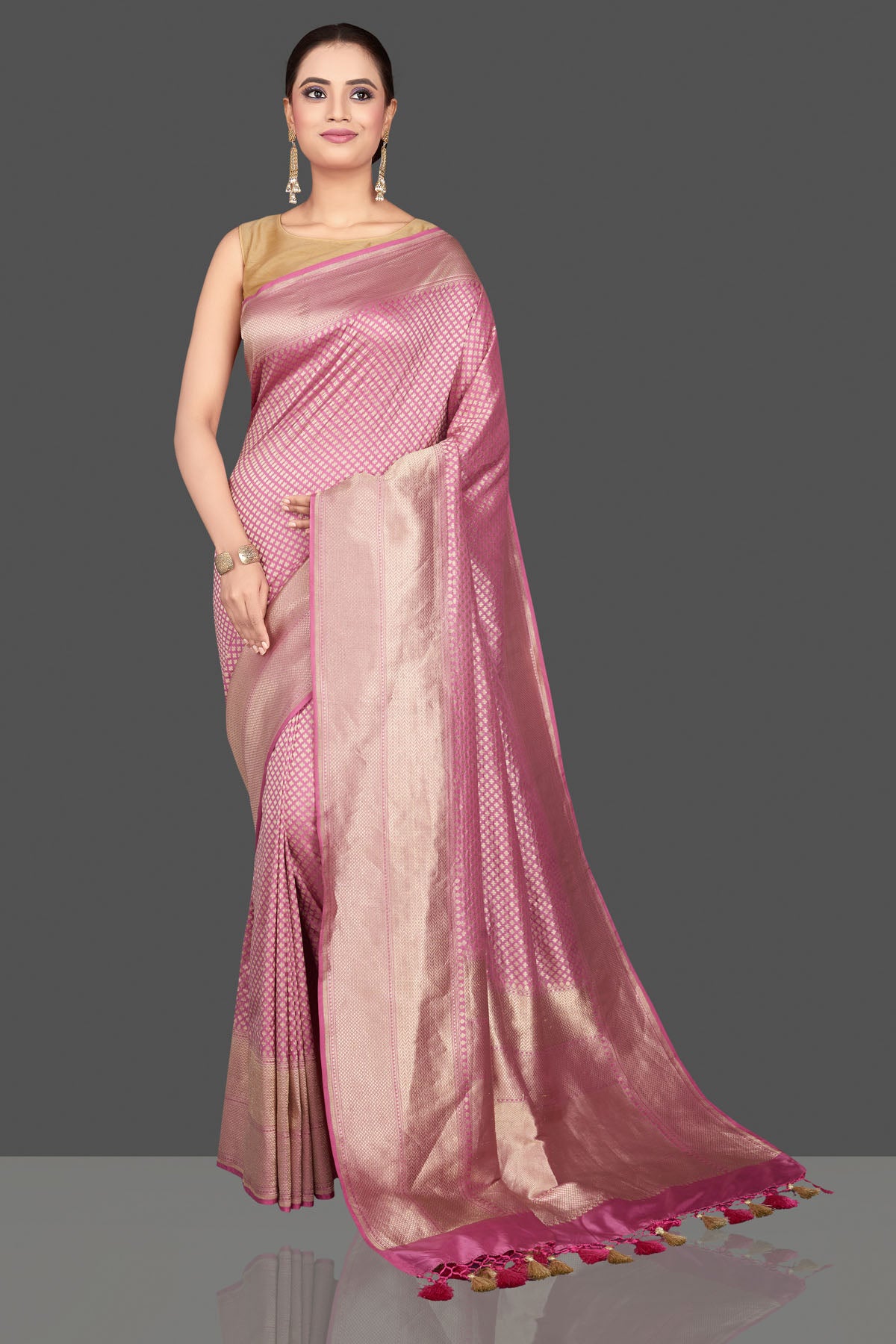 Shop stunning pink silk Katan saree online in USA with overall silver zari work. Look gorgeous on special occasions with exquisite Indian sarees, handwoven sarees, Banarasi sarees, pure silk sarees from Pure Elegance Indian saree store in USA.-front