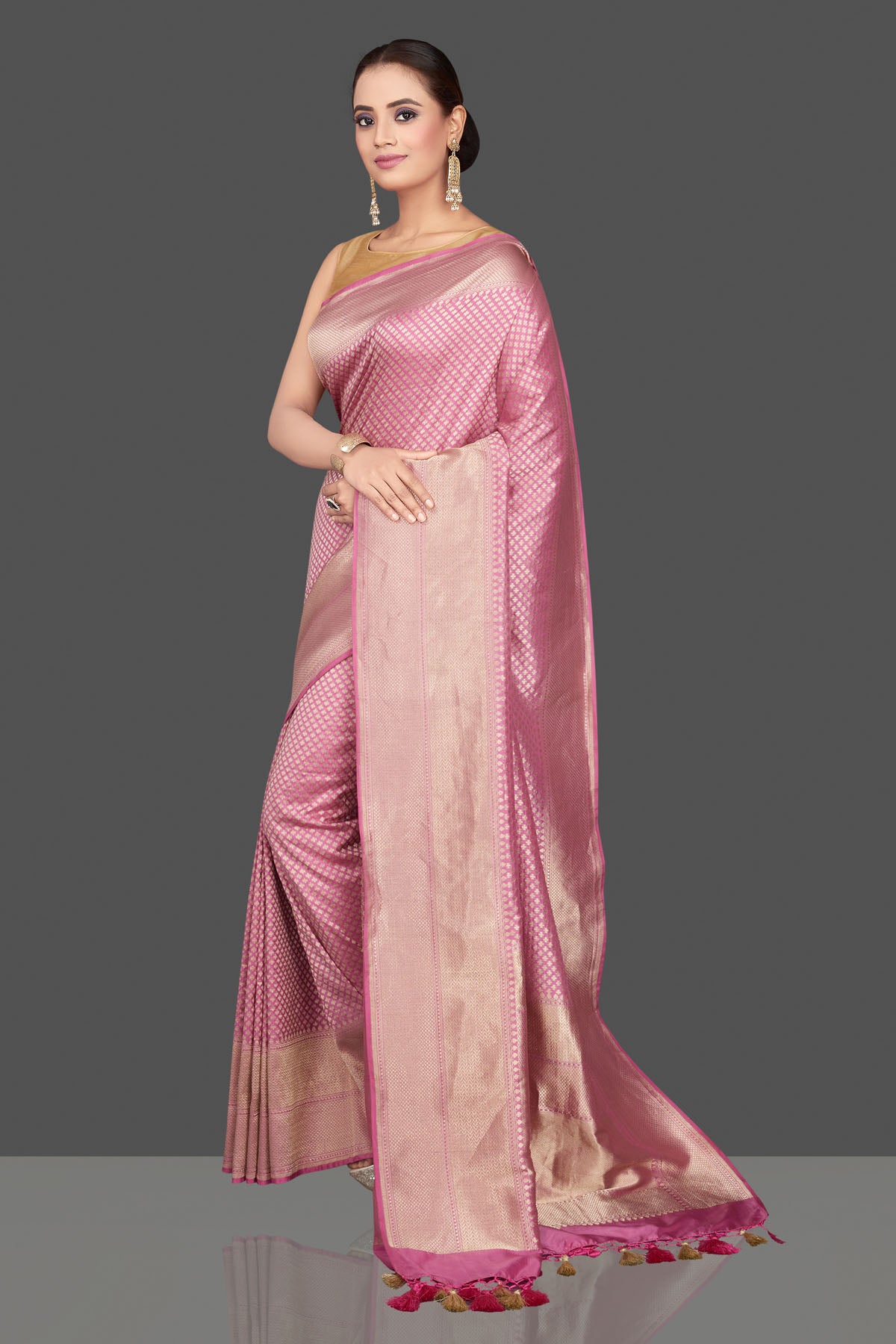 Shop stunning pink silk Katan saree online in USA with overall silver zari work. Look gorgeous on special occasions with exquisite Indian sarees, handwoven sarees, Banarasi sarees, pure silk sarees from Pure Elegance Indian saree store in USA.-full view