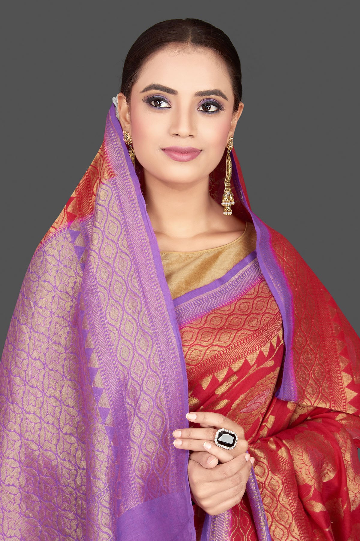 Buy stunning red silk Katan sari online in USA with overall purple zari pallu. Look gorgeous on special occasions with exquisite Indian sarees, handwoven sarees, Banarasi sarees, pure silk sarees from Pure Elegance Indian saree store in USA.-closeup