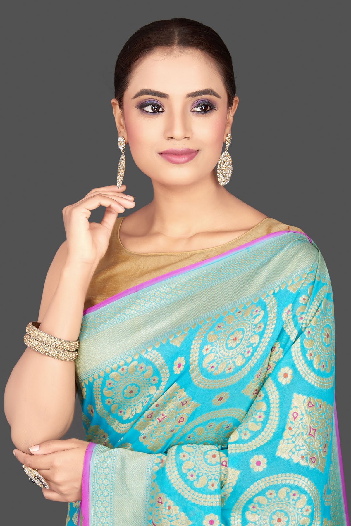Buy stunning turquoise blue Katan silk sari online in USA with overall zari wprk. Look gorgeous on special occasions with exquisite Indian sarees, handwoven sarees, Banarasi sarees, pure silk sarees from Pure Elegance Indian saree store in USA.-closeup