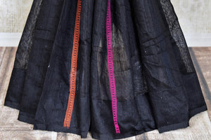 Shop stunning black matka silk saree online in USA with weave pallu. Look gorgeous on special occasions with exquisite Indian sarees, handwoven saris, Banarasi sarees, pure silk sarees from Pure Elegance Indian saree store in USA.-pleats