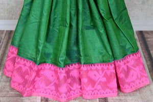 Shop stunning green raw silk sari online in USA with pink Jamdani border and saree blouse. Shop beautiful handwoven saris, chanderi sarees, Maheshwari sarees, pure silk sarees, Banarasi sarees online in USA from Pure Elegance Indian fashion store.-pleats