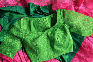 Shop stunning green raw silk sari online in USA with pink Jamdani border and saree blouse. Shop beautiful handwoven saris, chanderi sarees, Maheshwari sarees, pure silk sarees, Banarasi sarees online in USA from Pure Elegance Indian fashion store.-details