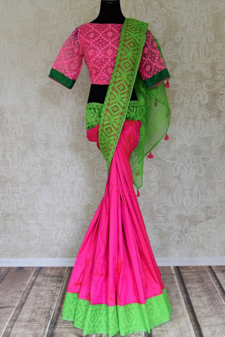 Buy gorgeous pink raw silk sari online in USA with green Jamdani border and saree blouse. Shop beautiful handwoven saris, chanderi sarees, Maheshwari sarees, pure silk sarees, Banarasi sarees online in USA from Pure Elegance Indian fashion store.-full view