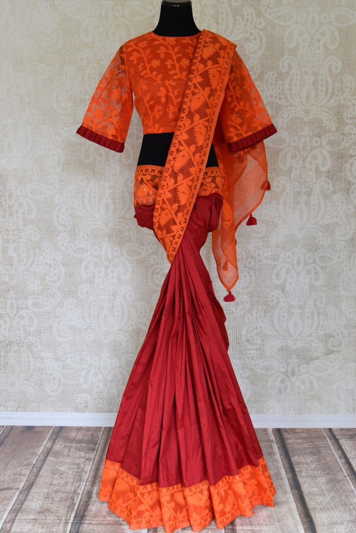 Shop beautiful red raw silk sari online in USA with orange Jamdani border and saree blouse. Shop beautiful handwoven saris, chanderi sarees, Maheshwari sarees, pure silk sarees, Banarasi sarees online in USA from Pure Elegance Indian fashion store.-full view