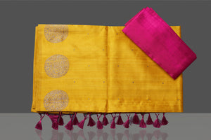 Shop gorgeous yellow tussar Banarasi saree online in USA with zari buta border. Go for stunning Indian designer sarees, georgette sarees, handwoven saris, embroidered sarees for festive occasions and weddings from Pure Elegance Indian clothing store in USA.-blouse