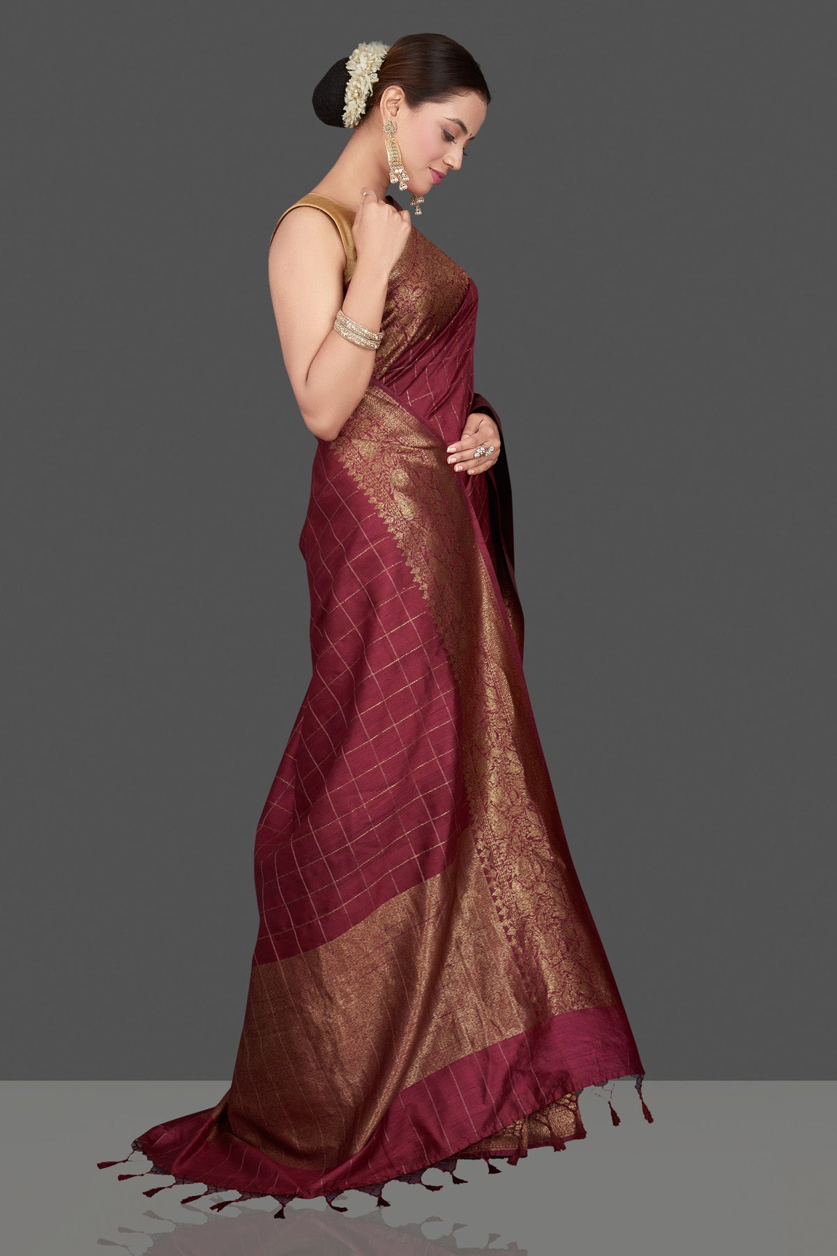Buy gorgeous plum check tussar Banarasi saree online in USA with antique zari border. Go for stunning Indian designer sarees, georgette sarees, handwoven saris, embroidered sarees for festive occasions and weddings from Pure Elegance Indian clothing store in USA.-side