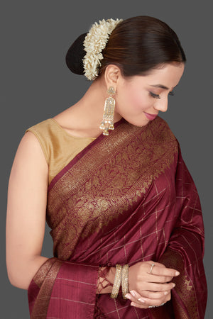 Buy gorgeous plum check tussar Banarasi saree online in USA with antique zari border. Go for stunning Indian designer sarees, georgette sarees, handwoven saris, embroidered sarees for festive occasions and weddings from Pure Elegance Indian clothing store in USA.-closeup