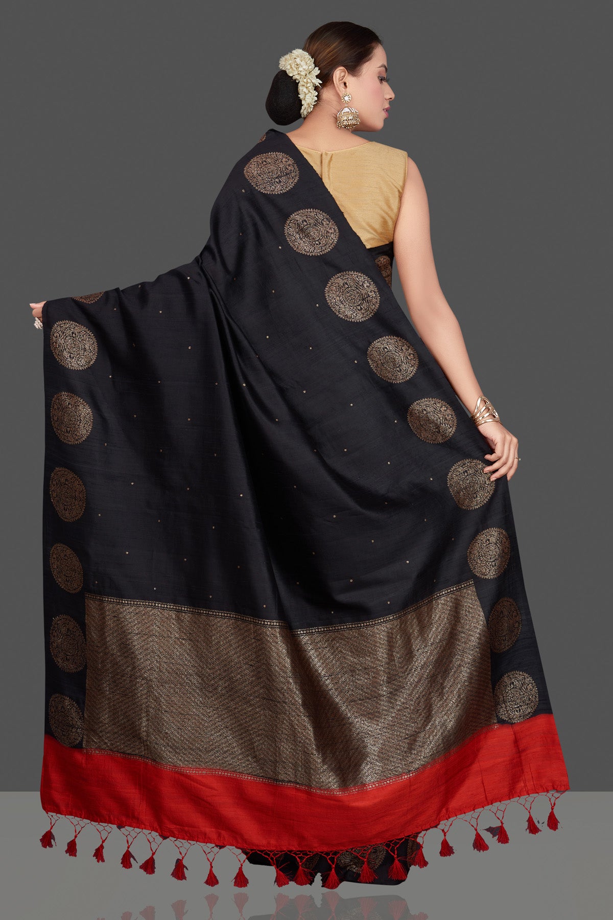 Buy ravishing black tussar Benarasi saree online in USA with antique zari buta border. Go for stunning Indian designer sarees, georgette sarees, handwoven saris, embroidered sarees for festive occasions and weddings from Pure Elegance Indian clothing store in USA.-back