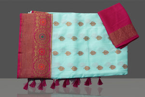 Buy gorgeous pastel blue Muga Banarasi sari online in USA with pink antique zari border. Get ready for festive occasions and weddings in tasteful designer sarees, Banarasi sarees, handwoven sarees from Pure Elegance Indian clothing store in USA.-blouse