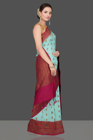 Buy gorgeous pastel blue Muga Banarasi sari online in USA with pink antique zari border. Get ready for festive occasions and weddings in tasteful designer sarees, Banarasi sarees, handwoven sarees from Pure Elegance Indian clothing store in USA.-side