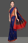 Buy beautiful dark blue Muga Banarasi saree online in USA with red antique zari border. Get ready for festive occasions and weddings in tasteful designer sarees, Banarasi sarees, handwoven sarees from Pure Elegance Indian clothing store in USA.-full view