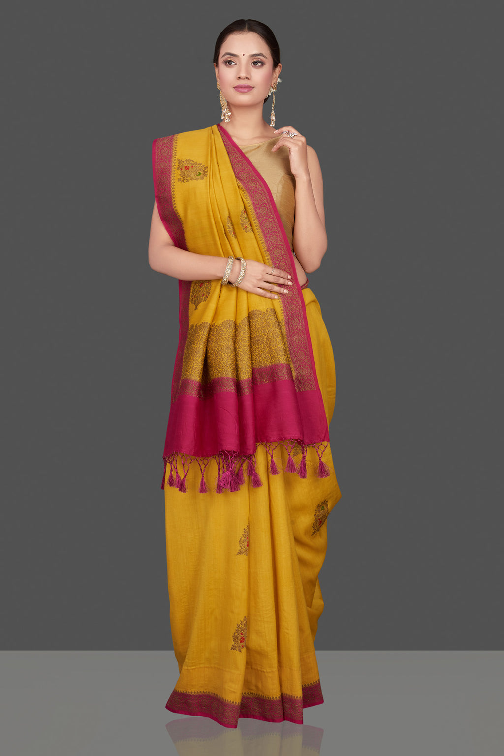 Shop stunning yellow Muga Banarasi saree online in USA with pink antique zari border. Get ready for festive occasions and weddings in tasteful designer sarees, Banarasi sarees, handwoven sarees from Pure Elegance Indian clothing store in USA.-full view