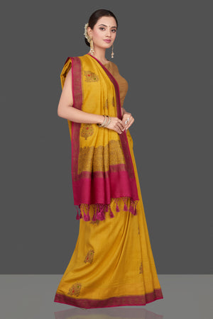 Shop stunning yellow Muga Banarasi saree online in USA with pink antique zari border. Get ready for festive occasions and weddings in tasteful designer sarees, Banarasi sarees, handwoven sarees from Pure Elegance Indian clothing store in USA.-side