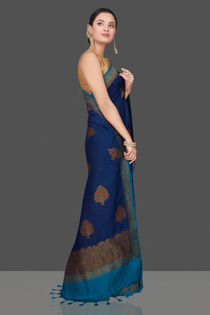 Buy beautiful dark blue Muga Banarasi sari online in USA with light blue antique zari border. Get ready for festive occasions and weddings in tasteful designer sarees, Banarasi sarees, handwoven sarees from Pure Elegance Indian clothing store in USA.-right