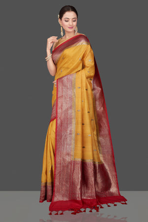 Shop beautiful yellow tussar Banarasi saree online in USA with red zari border. Get ready for festive occasions and weddings in tasteful designer saris, Banarasi sarees, handwoven sarees from Pure Elegance Indian clothing store in USA.-pallu