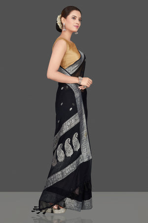 Buy black chiffon georgette saree online in USA with silver zari border. Go for stunning Indian designer sarees, georgette sarees, handwoven saris, embroidered sarees for festive occasions and weddings from Pure Elegance Indian clothing store in USA.-side