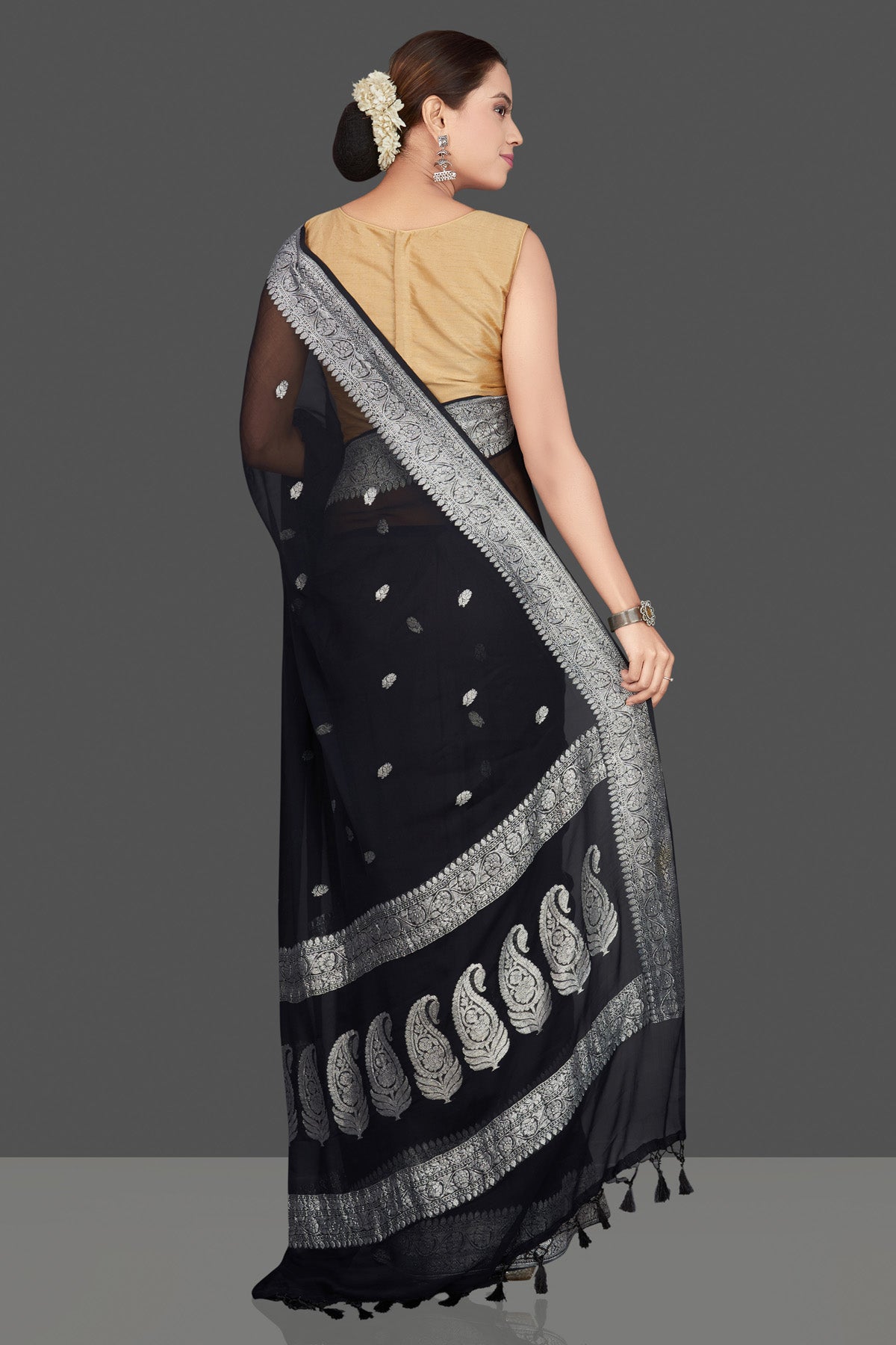 Buy black chiffon georgette saree online in USA with silver zari border. Go for stunning Indian designer sarees, georgette sarees, handwoven saris, embroidered sarees for festive occasions and weddings from Pure Elegance Indian clothing store in USA.-back