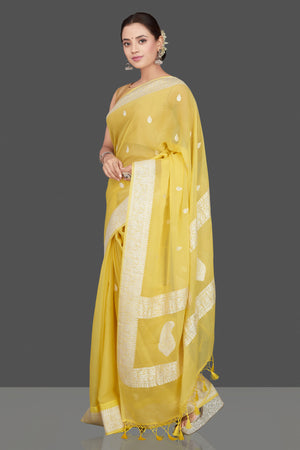 Shop charming yellow color chiffon georgette saree online in USA with silver zari border. Go for stunning Indian designer sarees, georgette sarees, handwoven saris, embroidered sarees for festive occasions and weddings from Pure Elegance Indian clothing store in USA.-pallu