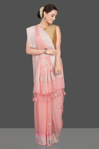 Shop gorgeous light pink chiffon georgette sari online in USA with silver zari border. Go for stunning Indian designer sarees, georgette sarees, handwoven saris, embroidered sarees for festive occasions and weddings from Pure Elegance Indian clothing store in USA.-full view