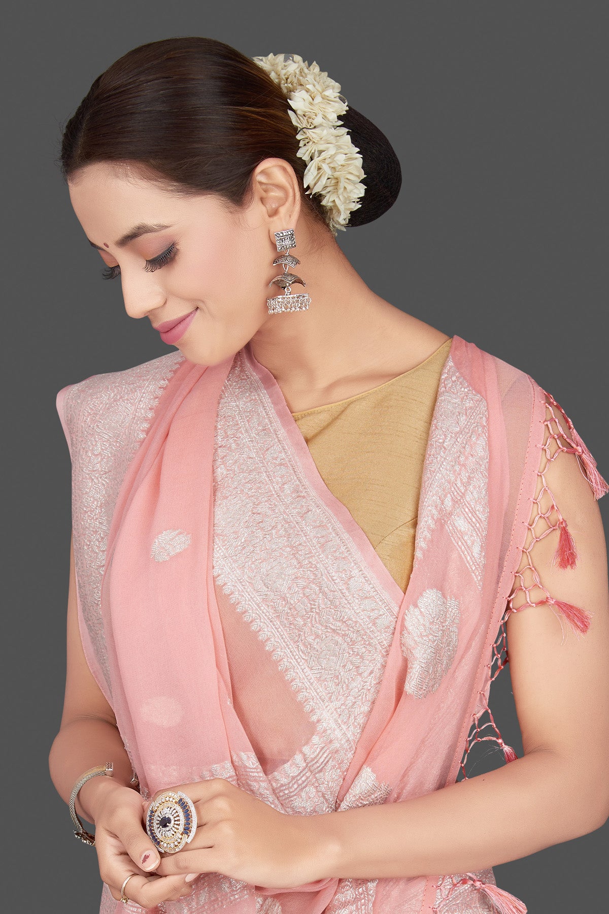 Shop gorgeous light pink chiffon georgette sari online in USA with silver zari border. Go for stunning Indian designer sarees, georgette sarees, handwoven saris, embroidered sarees for festive occasions and weddings from Pure Elegance Indian clothing store in USA.-closeup