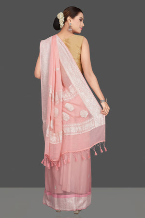 Shop gorgeous light pink chiffon georgette sari online in USA with silver zari border. Go for stunning Indian designer sarees, georgette sarees, handwoven saris, embroidered sarees for festive occasions and weddings from Pure Elegance Indian clothing store in USA.-back