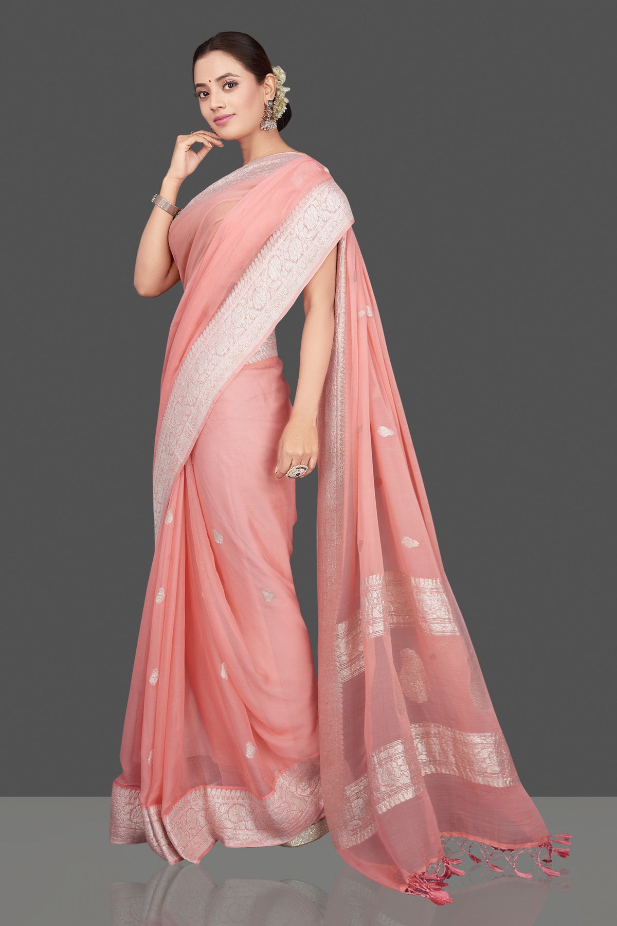 Shop stunning blush pink georgette chiffon sari online in USA with silver zari border. Go for stunning Indian designer sarees, georgette sarees, handwoven saris, embroidered sarees for festive occasions and weddings from Pure Elegance Indian clothing store in USA.-full view