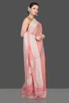 Shop stunning blush pink georgette chiffon sari online in USA with silver zari border. Go for stunning Indian designer sarees, georgette sarees, handwoven saris, embroidered sarees for festive occasions and weddings from Pure Elegance Indian clothing store in USA.-side