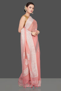 Shop stunning blush pink georgette chiffon sari online in USA with silver zari border. Go for stunning Indian designer sarees, georgette sarees, handwoven saris, embroidered sarees for festive occasions and weddings from Pure Elegance Indian clothing store in USA.-side