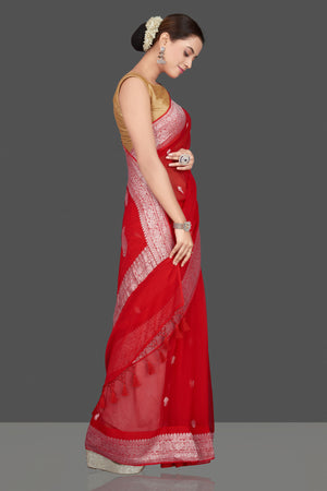 Shop gorgeous red georgette chiffon sari online in USA with silver zari border. Go for stunning Indian designer sarees, georgette sarees, handwoven sarees, embroidered sarees for festive occasions and weddings from Pure Elegance Indian clothing store in USA.-side