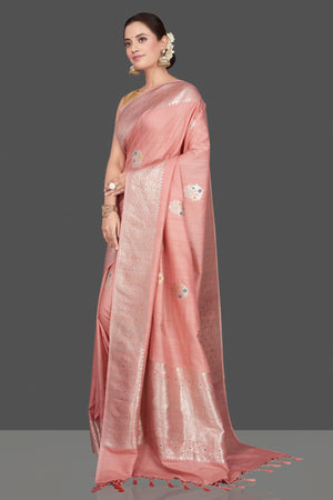 Shop stunning blush pink tussar khadi georgette Banarasi saree online in USA. Radiate ethnic charm on festive occasions in stunning Banarasi sarees, handloom sarees, pure silk sarees, embroidered sarees, designer sarees from Pure Elegance Indian saree store in USA.-pallu