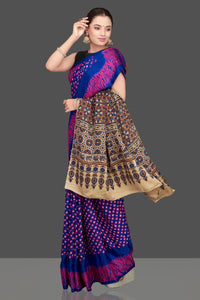 Buy stunning blue and pink gajji silk saree online in USA with ajrakh pallu. Choose from a stunning range of designer sarees, printed sarees, handwoven saris, embroidered sarees for special occasions from Pure Elegance Indian saree store in USA.-full view