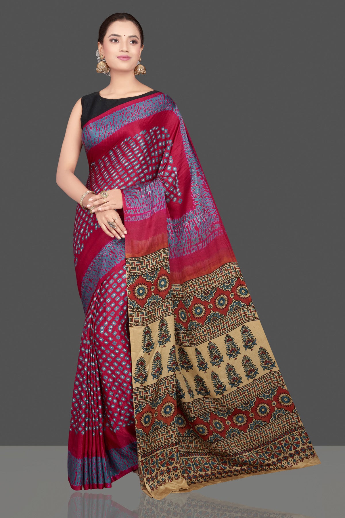 Shop stunning magenta gajji silk saree online in USA with ajrakh pallu. Choose from a stunning range of designer sarees, printed sarees, handwoven saris, embroidered sarees for special occasions from Pure Elegance Indian saree store in USA.-full view