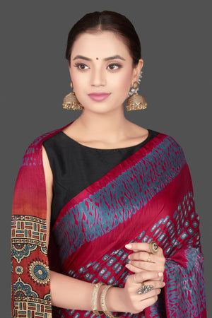 Shop stunning magenta gajji silk saree online in USA with ajrakh pallu. Choose from a stunning range of designer sarees, printed sarees, handwoven saris, embroidered sarees for special occasions from Pure Elegance Indian saree store in USA.-closeup