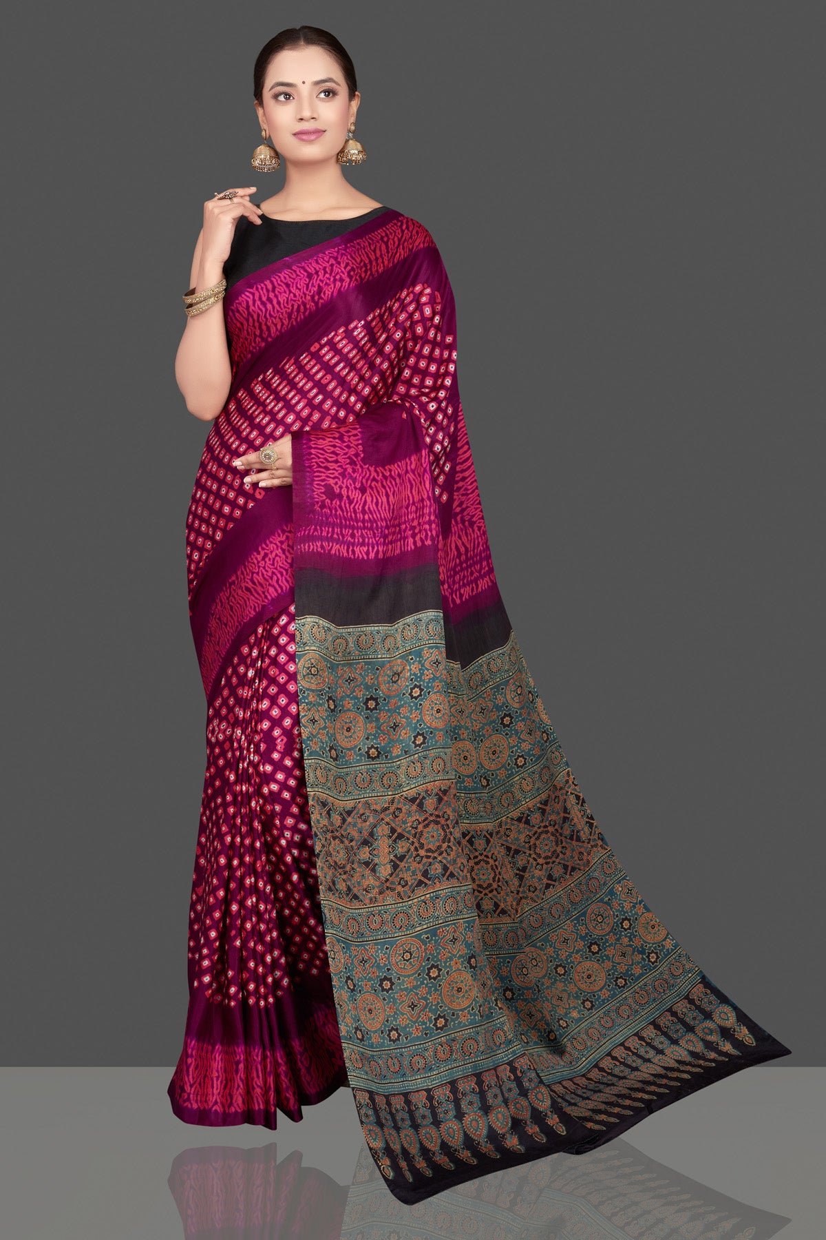 Buy magenta and pink printed gajji silk sari online in USA with Ajrakh pallu. Choose from a stunning range of designer sarees, printed sarees, handwoven saris, embroidered sarees for special occasions from Pure Elegance Indian saree store in USA.-full view