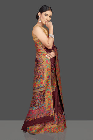 Shop stunning wine color tussar silk sari online in USA with Kani embroidery. Look beautiful on weddings and special occasions in stunning Kanchipuram saris, pure silk sarees, handwoven saris from Pure Elegance Indian fashion store in USA.-side