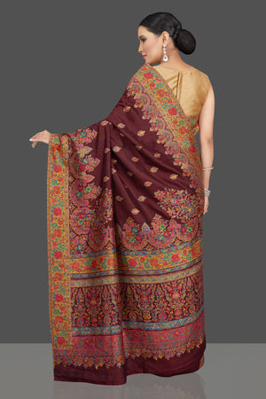 Shop stunning wine color tussar silk sari online in USA with Kani embroidery. Look beautiful on weddings and special occasions in stunning Kanchipuram saris, pure silk sarees, handwoven saris from Pure Elegance Indian fashion store in USA.-back