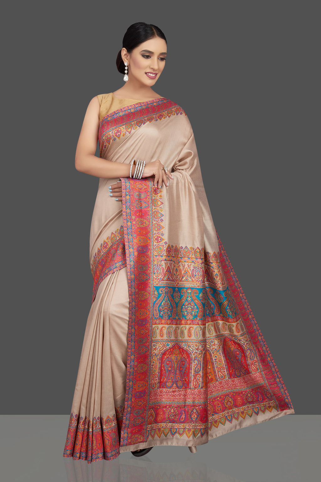 Shop beautiful cream tussar silk sari online in USA with kani embroidery. Look beautiful on weddings and special occasions in stunning Kanchipuram saris, pure silk sarees, handwoven saris from Pure Elegance Indian fashion store in USA.-full view